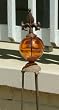 Rustic Iron Fleur de Lis Obelisk with Amber Glass Gazing Globe
