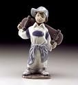 Nao by Lladro "Little Skateboarder" Figurine.