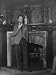 Actor Leslie Howard Smoking Pipe as He Stands by His Fireplace, at Home in Dorking, E...