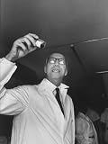 Dr. Willem Kolff Holding a Urine Sample Indicating That an Artificial Kidney Operation Was a Success Photographic Poster Print by Ralph Morse, 12x16