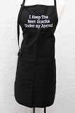 Black "I Keep the Best Snacks Under My Apron" Embroidered Apron by 