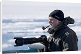 Canvas Prints of Pipe smoking photographer in a wooly hat on holiday in the Arctic from ArcticPhoto