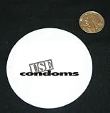 3" button / pin printed with Use Condoms Sign