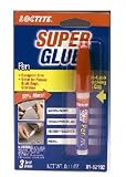 Adhesive -Loctite Super Glue .