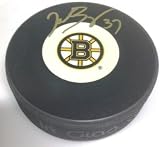 Autographed Patrice Bergeron Hockey Puck - logo - Autographed NHL Pucks