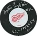 Metro Prystai autographed Hockey Puck (Detroit Red Wings)