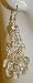 Saka's Silver Toned Chandelier Earrings with Dangling Acrylic Discs Image