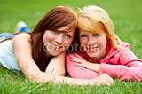 IMAGE OF Wallmonkeys Peel and Stick Wall Decals - Two Young Teens Relaxing in a Park. - 72