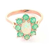 Bague en or rose 375/1000 sertie d'opale et d'emeraudes
