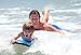 Young Father and Son Learning to Surf - 24"W x 16"H - Peel and Stick Wall Decal by Wallmonkeys