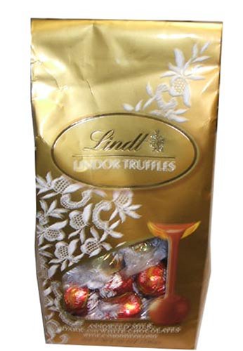 Buy Lindt Lindor Truffles, Assorted Milk, Dark and White Chocolates with a Smooth Filling-19oz. Bag(pack of 2) online at Discounted New and Used prices. Delivered to your door with Off-The-Bookshelf.
