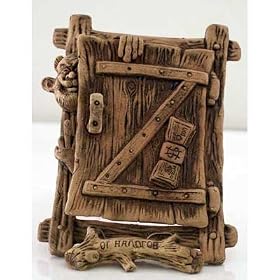 CERAMIC AMULET/Door Against Taxes [Made in Russia. Size: 7 x 5.5 inches (17 x 13.5 cm). Material: ceramic (clay). Hand-crafted] [The gnome behind this door will do everything in his power to keep your money from leaving your house! This marvelous sculpture can be hung and add a touch of whimsy to any room in your house. Amulets, or talismans, possess a magical ability to defend their owners or improve various areas of their lives. They can protect against sickness, bad luck, and danger; they can also bring success, luck, love, money, and more. This gnome - hand-sculpted from natural clay - will tirelessly defend you and your loved ones from any sort of misfortune!]