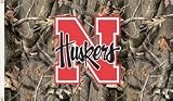 Nebraska Cornhuskers 3 Ft. x 5 Ft. Flag w/Grommets - Realtree Camo Background