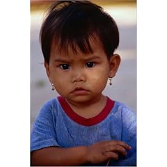 Poster 70 x 110 cm - "A rather serious little face on a young girl from Nakhon Pathom." von Martin Llado / Lonely Planet Images - auch in anderen Gr��en und als Leinwandbild erh�ltlich
