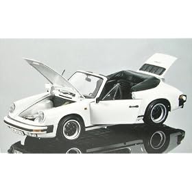 Minichamps - Vehicules  - 100063031 - Porsche 911 Carrera Cab. 83 blanc - 1/18