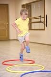 Boy Makes Exercise with Hoops - 36