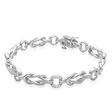 IMAGE OF Sterling Silver Diamond Knot Bracelet (1/4 cttw, I-J Color, I2-I3 Clarity), 7.25