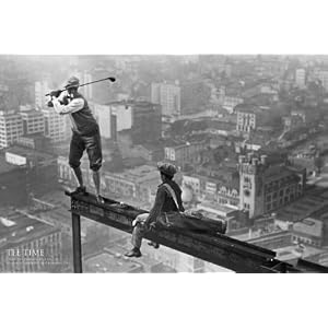 GOLF ON A SKYSCRAPER FRAMED ART