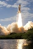 Wallmonkeys Peel and Stick Wall Decals - Space Shuttle Atlantis Lifts off from Its Launch Pad at Kennedy Space Center, Florida. - Removable Graphic