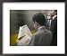 Man Reading Newspaper at Shinjuku Station, Tokyo, Kanto, Japan Places Framed Art Poster Print by Brent Winebrenner, 22x18