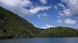 Fisherman on Beautiful Chapel Pond in the Adirondacks Photograph - Beautiful 16"x20" Photographic Print by Brendan Reals