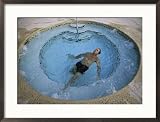 High Angle View of a Mid Adult Man in a Hot Tub Framed Photographic Poster Print, 29x21