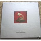 Click here to buy Official Grammy Awards Record of The Year Box Set of 4 Burgandy Albums by  Peggy Lee, Nat King Cole, Christopher Cross, Jim Croce, Johnny Cash, Perry Como and many more Featured Artists: Beatles .