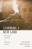 Learning a New Land: Immigrant Students in American Society [Hardcover]