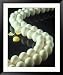 One Cracked Egg in Line with Unbroken Eggs Framed Photographic Poster Print by Ewing Galloway, 33x39
