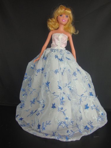 A White Strapless Ball Gown with Tiny Blue Flowers Made to Fit the Barbie Doll