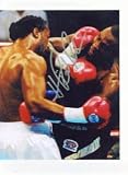 HASIM RAHMAN AUTOGRAPHED 8X10 BOXING PHOTO VS LENNOX LEWIS (BOXING)