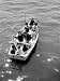 Joe Powers with Eight of His Ten Children Fishing in a Rowboat on Long Island Sound Photographic Poster Print by Yale Joel, 12x16
