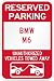 Reserved parking BMW M6 only others towed metal sign