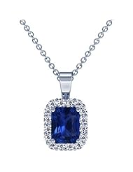 Platinum Emerald Cut Blue Sapphire And Round Diamond Pendant