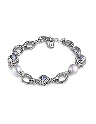 Sterling Silver This sterling silver Sara Blaine bracelet features beautiful Iolite topaz accented by freshwater pearls for a sweetly feminine look.