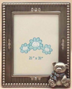 Simple yet adorable 2.5x3.5 metal frame decorated with clear rhinestones and an adorable teddy bear adorned with blue crystals. Perfect for framing an adorable baby boy and the family who loves him.