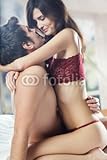 Wallmonkeys Peel and Stick Wall Decals - Couple and Hugging on Bed in Bedroom, in Passion - 72