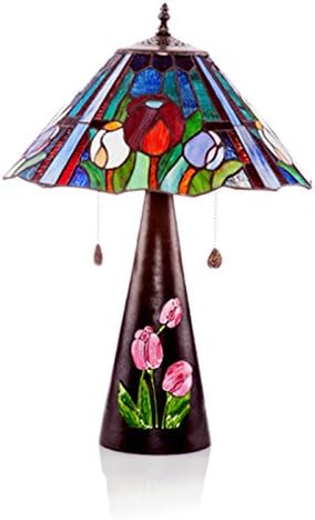 22.75"h Tiffany Style Striped Tulip Table Lamp, This Tulip Lamp Is a Beautiful Gem. Bring Summer Into Your Home with Three Tulips in Partial Bloom. See the Vibrancy in the Shade That Reflects the Artist's Hand. Hand-painted Enamel Flowers on the Base Finish the Masterpiece to Make It a One-of-a-kind Treasure. Product Dimensions: 22.75"h X 15.75"l X 15.75"w Please Note: We Make Every Effort to Ensure Product Detail & Colors Are Represented Accurately on Our Website. Though Since Our Items Are Hand-crafted, There May Be Slight Color Variations in the Glass. This Variation Is Normal and Makes Each of Our Products Unique & Beautiful.