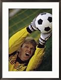 Goalie Attempting to Stop a Soccer Ball Framed Photographic Poster Print, 21x29