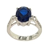 Synthetic Sapphire Oval Single Stone Silvertone Fashion Ring with Side Detail in Clear Cubic Zirconia