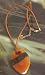 Fashion necklace 714 encapsulated lace on leather strap - brown