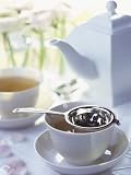 Tea Strainer on Cup of Tea Premium Photographic Poster Print by Jean Francois Hamon, 12x16