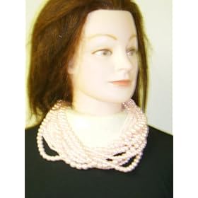 Click here to buy Twelve Strand Light Pink Cultured Graduated Pearl Necklace and Matching Earrings for Women and... by Gita.