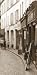 City Street Buildings by Francisco Fernandez. Size 14.75 inches width by 30.00 inches height. High Quality Art Poster Print