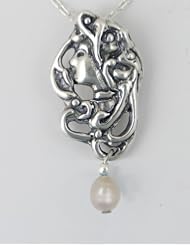 A Lovely Sterling Silver Victorian Lady Necklace Accented with a Fresh Water Pearl...Sweet!