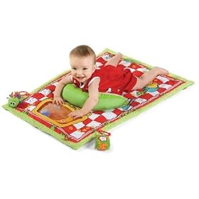 baby playing on playmat