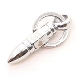 Pendentif en métal argenté en forme de balle