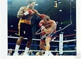 TOMMY MORRISON AUTOGRAPHED BOXING 8X10 PHOTO VS LENNOX LEWIS (BOXING)