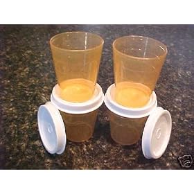 Tupperware Midgets set of 4 in Orange Peel with White Seals by Tupperware