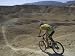 Back View of Competitior Riding Downhill in the Mount Sodom International Mountain Bi...